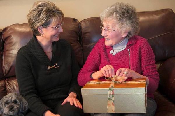 giving a gift to a senior.