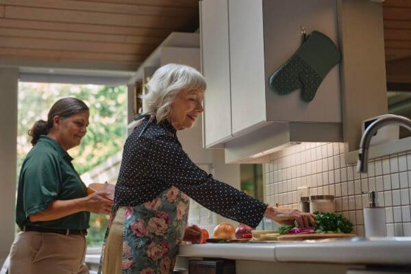carepro elderly woman kitchen 1200x800
